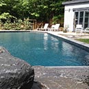 Big rocks in Landscape Design on pool in Garrison New York